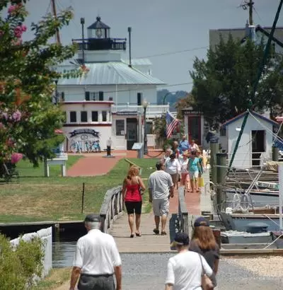 Tourists walking along waterfront