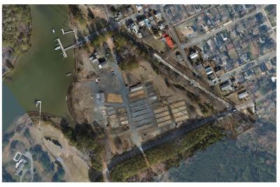 Drone image of San Domingo Creek Park area for Demolition depicting outbuildings and land contours